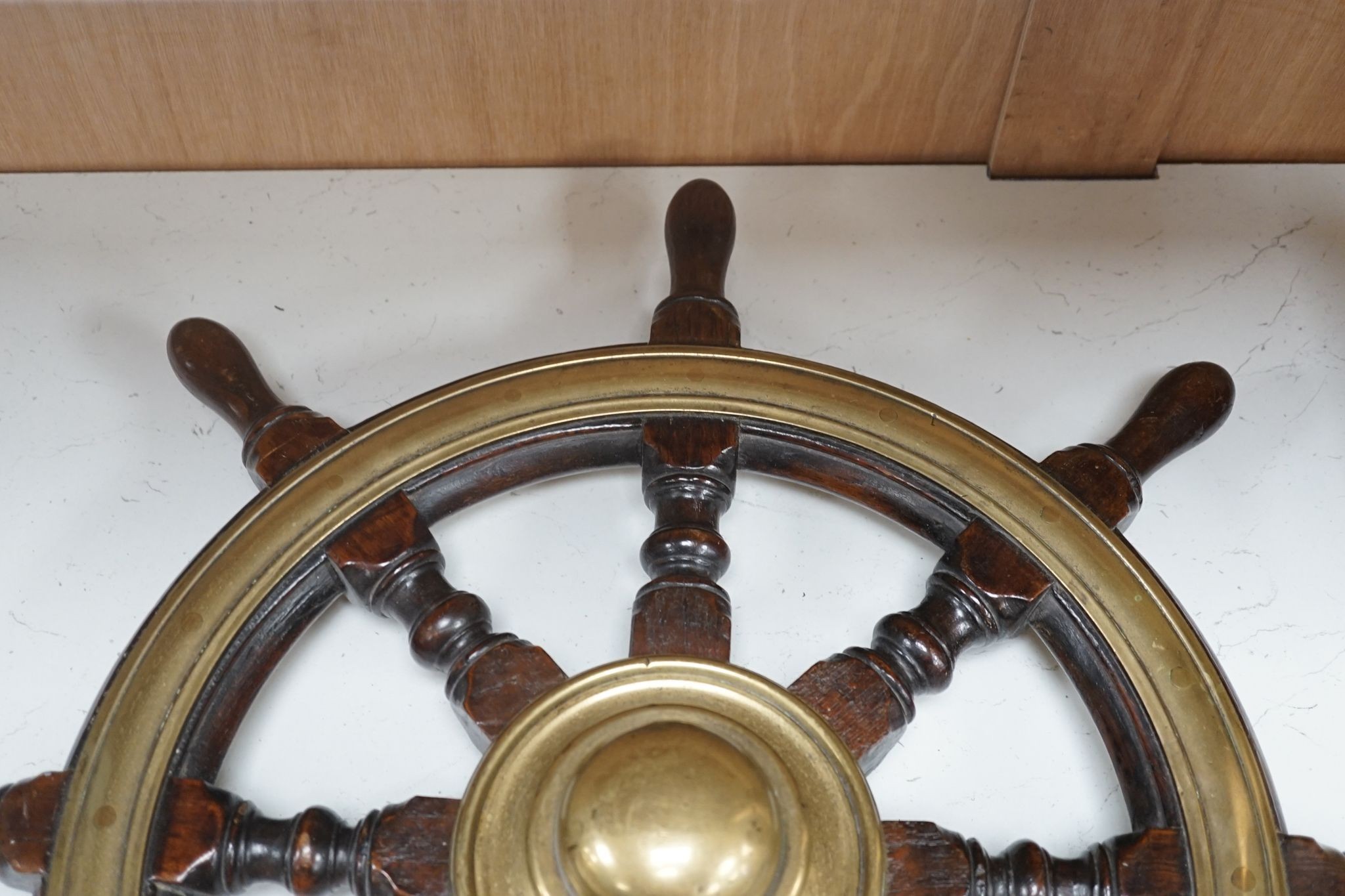 A 19th century mahogany and brass mounted ship's wheel, 60cm